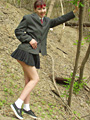 Schoolgirl Cleo with red coloured hair shows her nice and tiny tits outdoors in the wood - 1