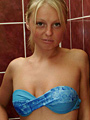 Blonde teen girl Maria takes off her sexy bikini and has fun in the shower - 1