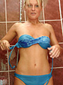 Blonde teen girl Maria takes off her sexy bikini and has fun in the shower - 8